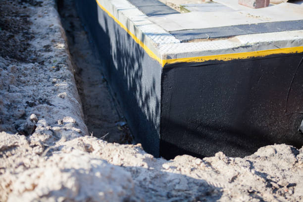 Professional Emergency Waterproofing technician working in New Germany, MN